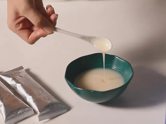 一勺奶粉勺是几克每伴米粉？